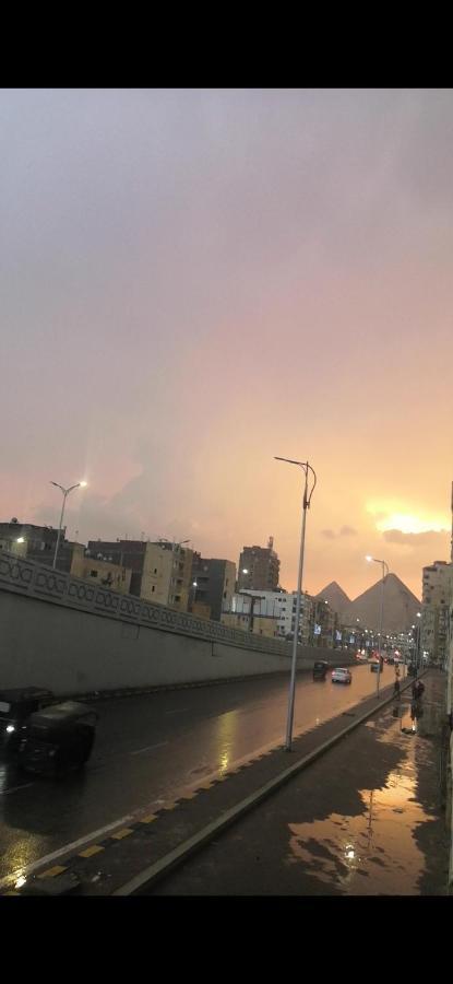 Pyramids Road Guest House Cozy Rooms And Rooftop Breakfast With The Pyramids View Nazlet el-Sisi Bagian luar foto