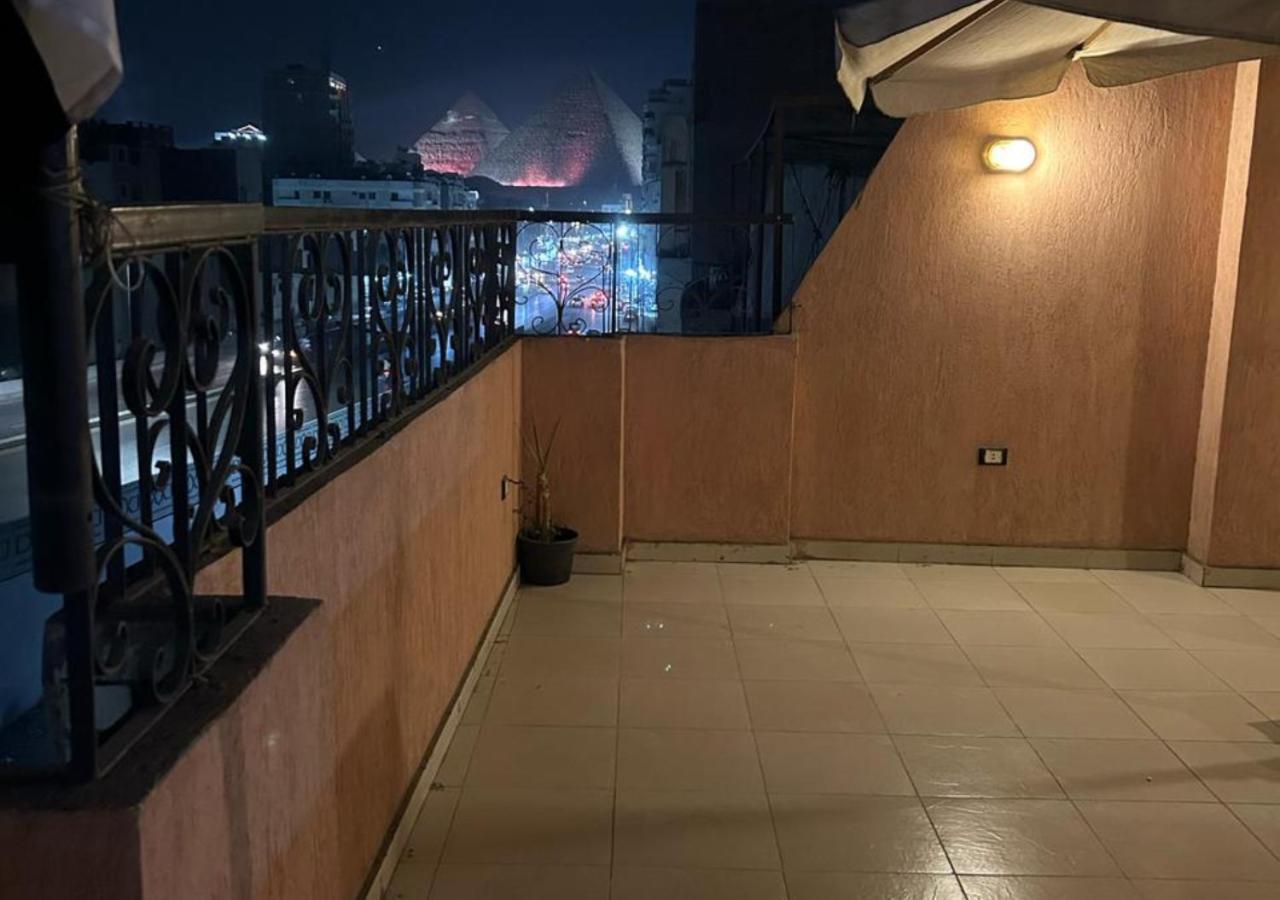 Pyramids Road Guest House Cozy Rooms And Rooftop Breakfast With The Pyramids View Nazlet el-Sisi Bagian luar foto